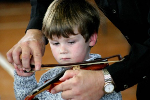 Как учить ребенка музыке?