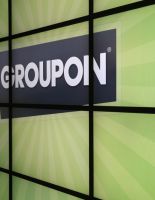 История Groupon